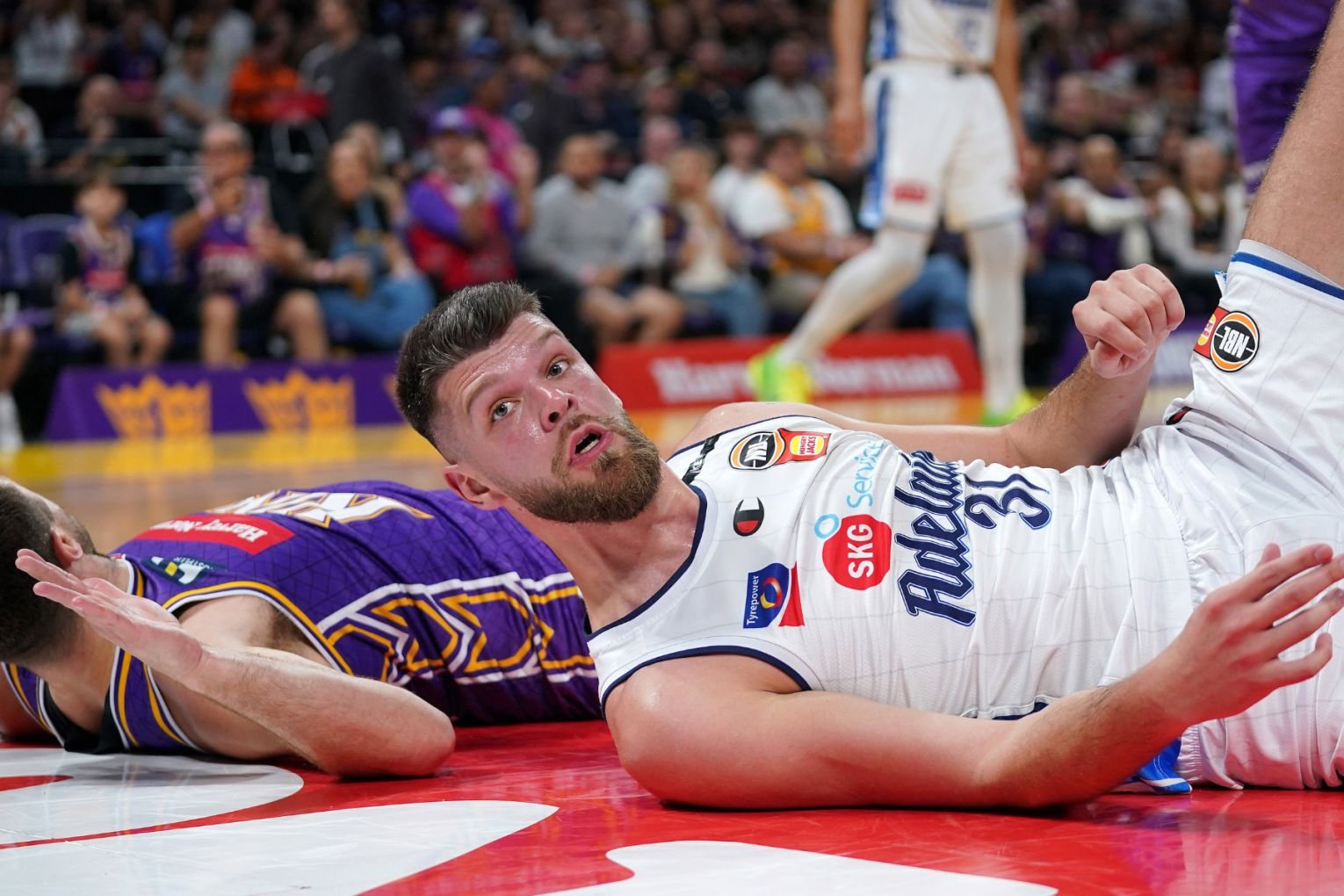 Nick Rakocevic of the 36ers falls to the floor during NBL grand final, game five, Sydney Kings v Adelaide 36ers, at Qudos Bank Arena in Sydney, Sunday, April 5, 2026. Picture: AAP Image/Robbie Stephenson