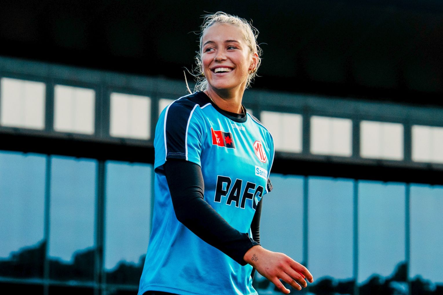 Port Adelaide AFLW star Matilda Sholz is the first women's footballer to win consecutive best-and-fairest awards for the club. She is also a role model through her ambassadorship with Kickstart for Kids.