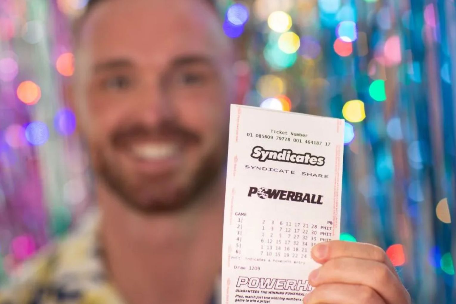 A Queensland dad almost missed his multimillion-dollar win because he was "too busy" at work. 