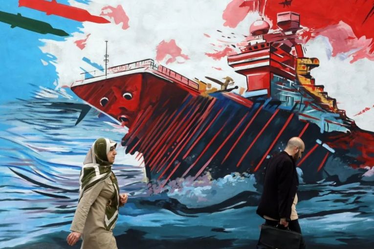 Thumbnail for Iran seizes ships in strait after Trump halts attacks