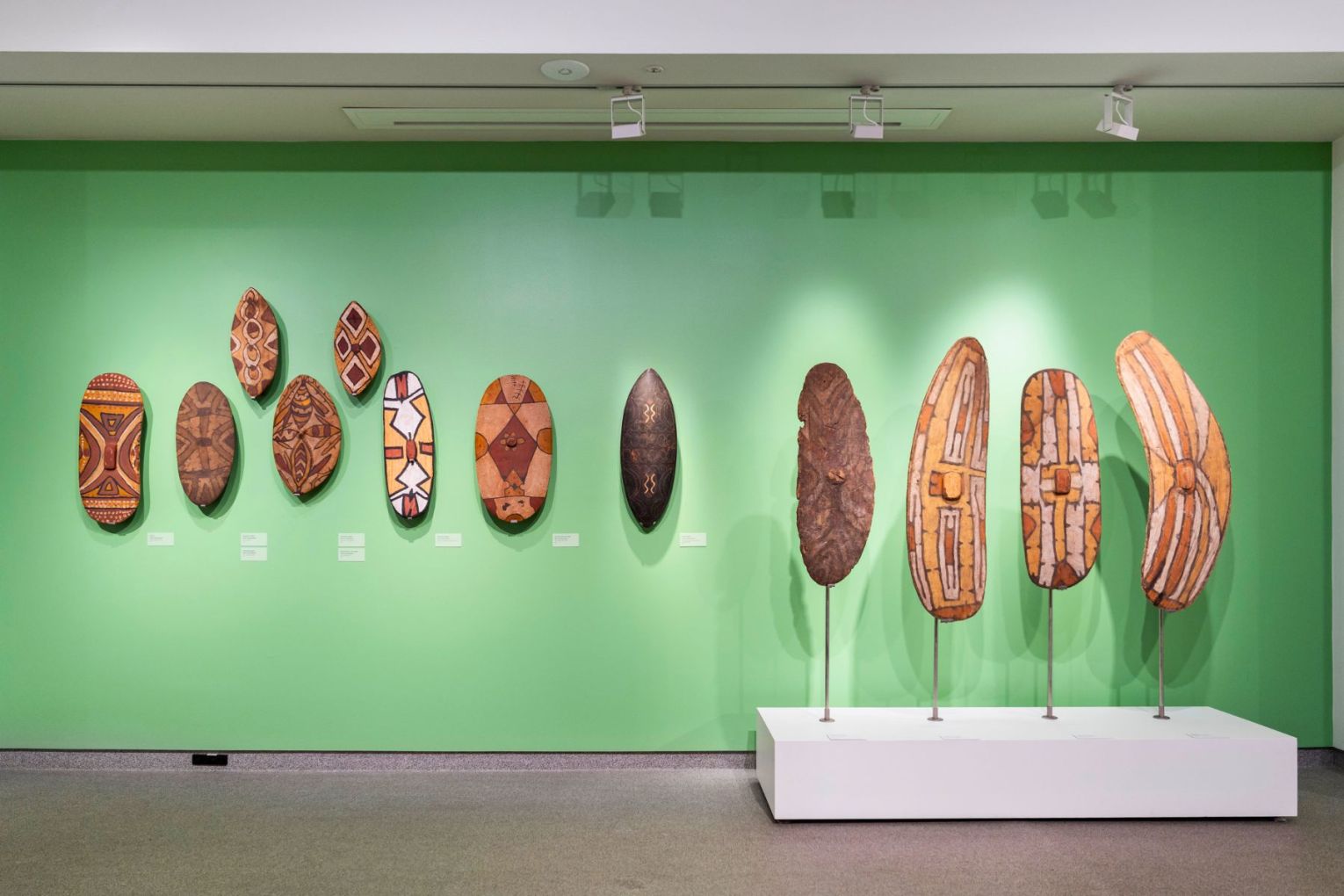 A wall of rainforest shields is one of the displays in an exhibition  showing at the UQ Anthroplogy Museum. Photo: Louis Lim