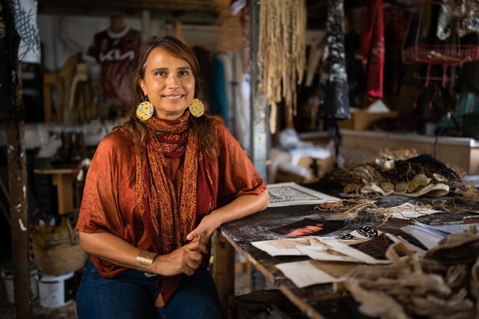 Museum of Brisbane artist-in-residence, Delvene Cockatoo-Collins in her studio on Minjerribah/North Stradbroke Island. Photo:  Vivid Visual Co