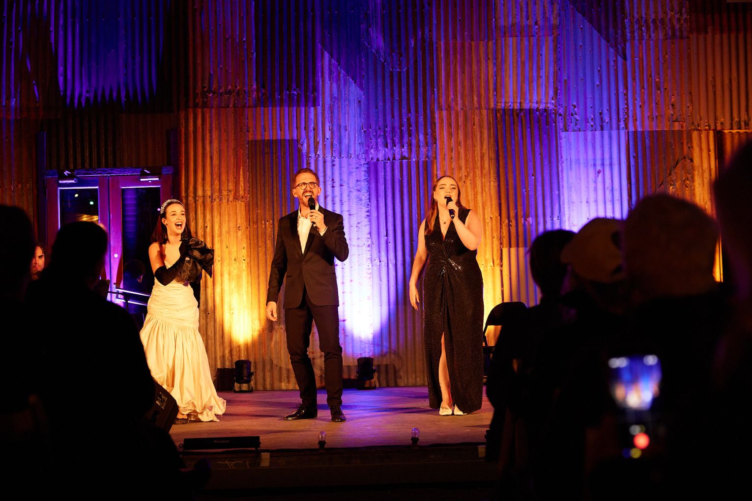Baritone Jason Barry-Smith and sopranos Gabrielle Diaz and Maddy Stevens perform at Dustarena during the Festival of Outback Opera.