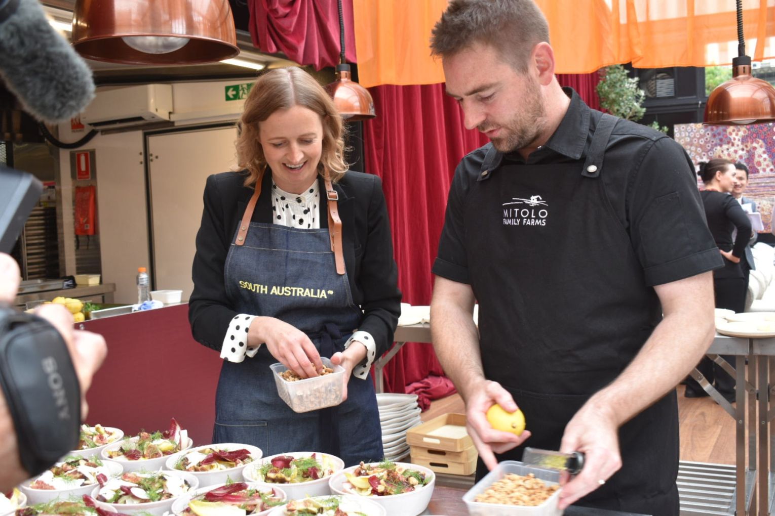 Tourism Minister Emily Bourke with chef Calum Hann at Tasting Australia. Picture: Helen Karakulak/InDaily