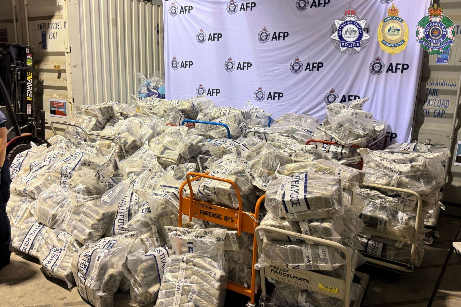 Cocaine worth more than $800 million has been allegedly concealed underground below shipping containers, in Australia's biggest ever seizure of the drug. Picture: AFP