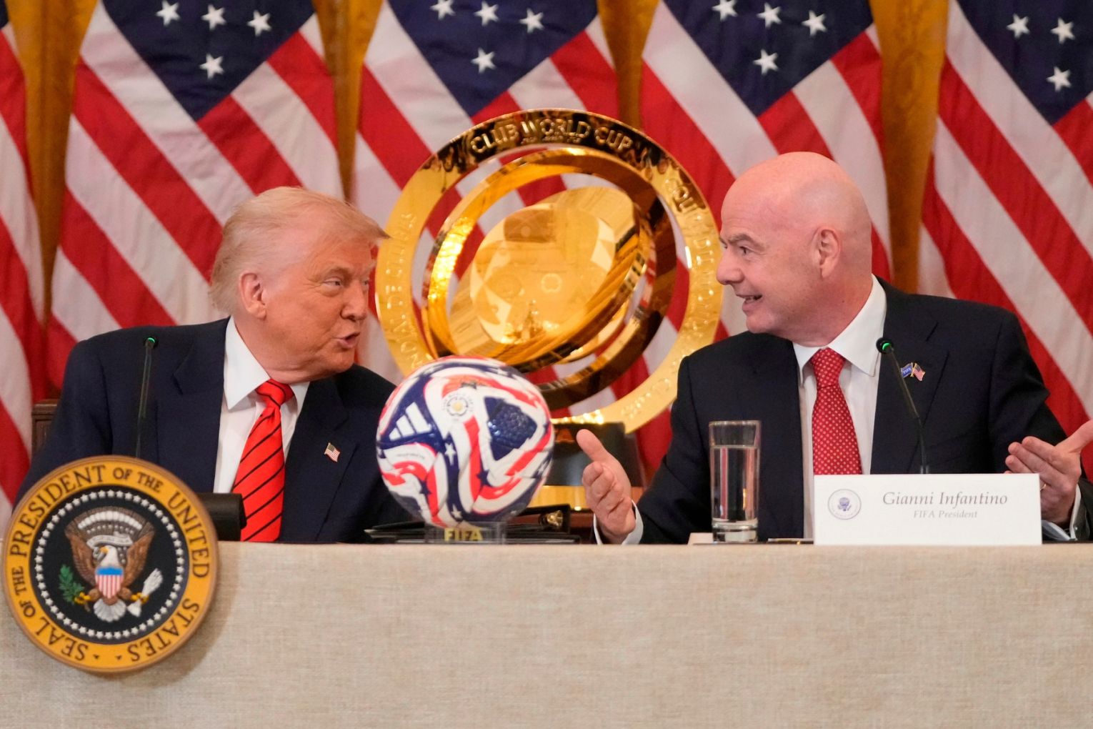 President Donald Trump and FIFA President Gianni Infantino talk during a FIFA task force meeting in the East Room of the White House, May 6, 2025, in Washington. Picture: AP/Mark Schiefelbein