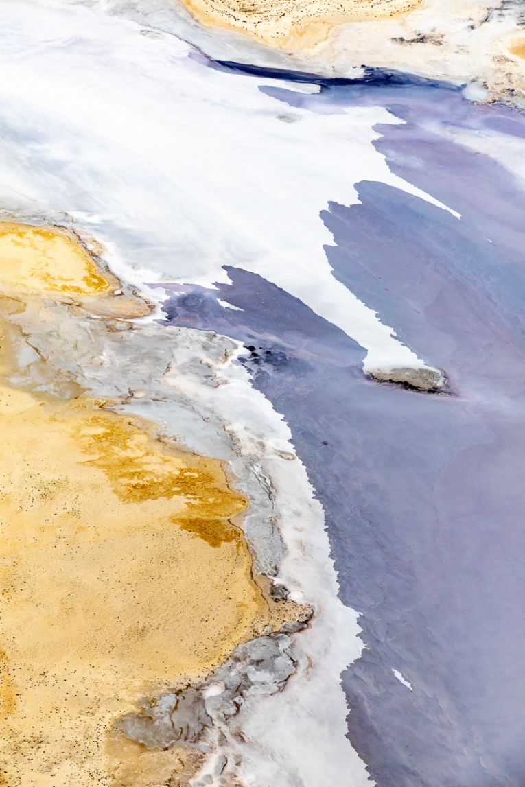 Water, salt and land combine to form abstract shapes.