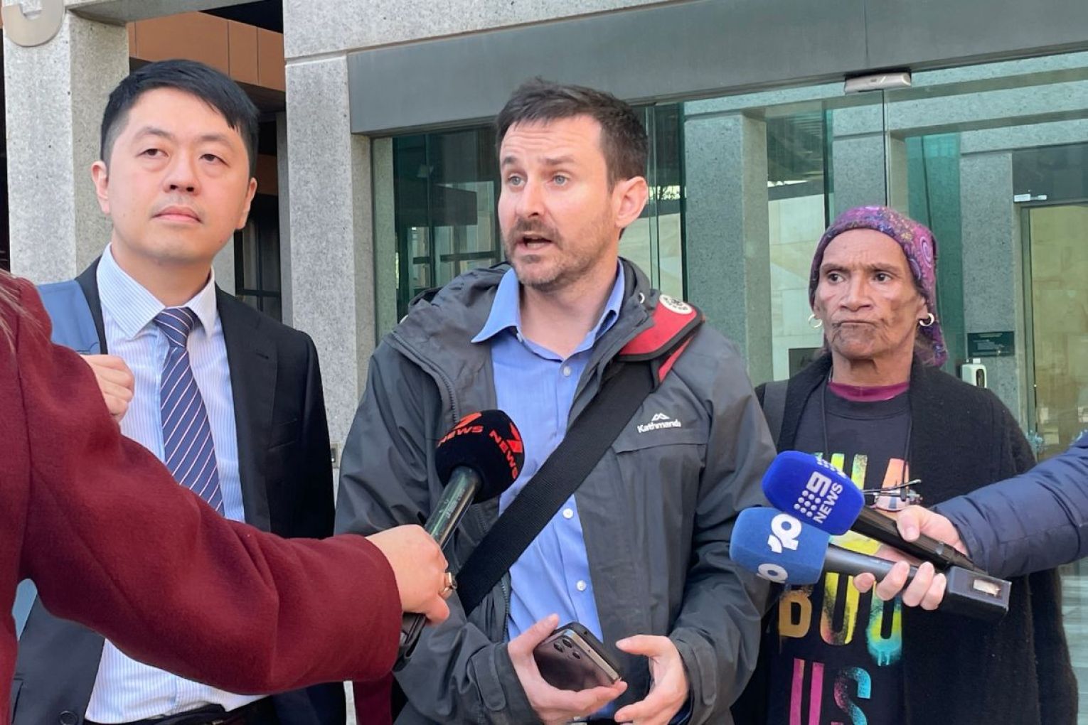 Lawyer Ted Hui, Edwin Kemp Attrill and Janette Milera outside the Federal Court building in Adelaide today. Picture: Helen Karakulak/InDaily