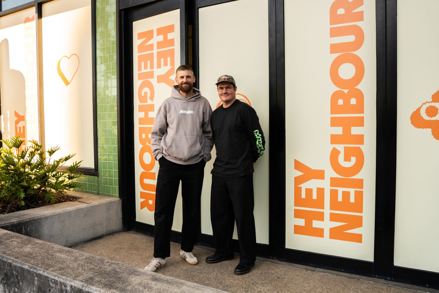 Matt McIver and Gerard Martin outside the future home of Neighbour in Newstead | Credit: image supplied