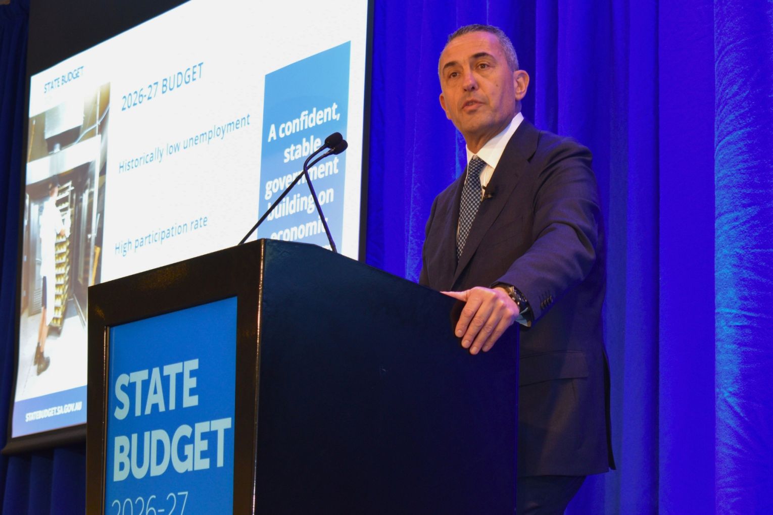 Treasurer Tom Koutsantonis handing down the 2026/27 state budget. Photo: Helen Karakulak/InDaily.