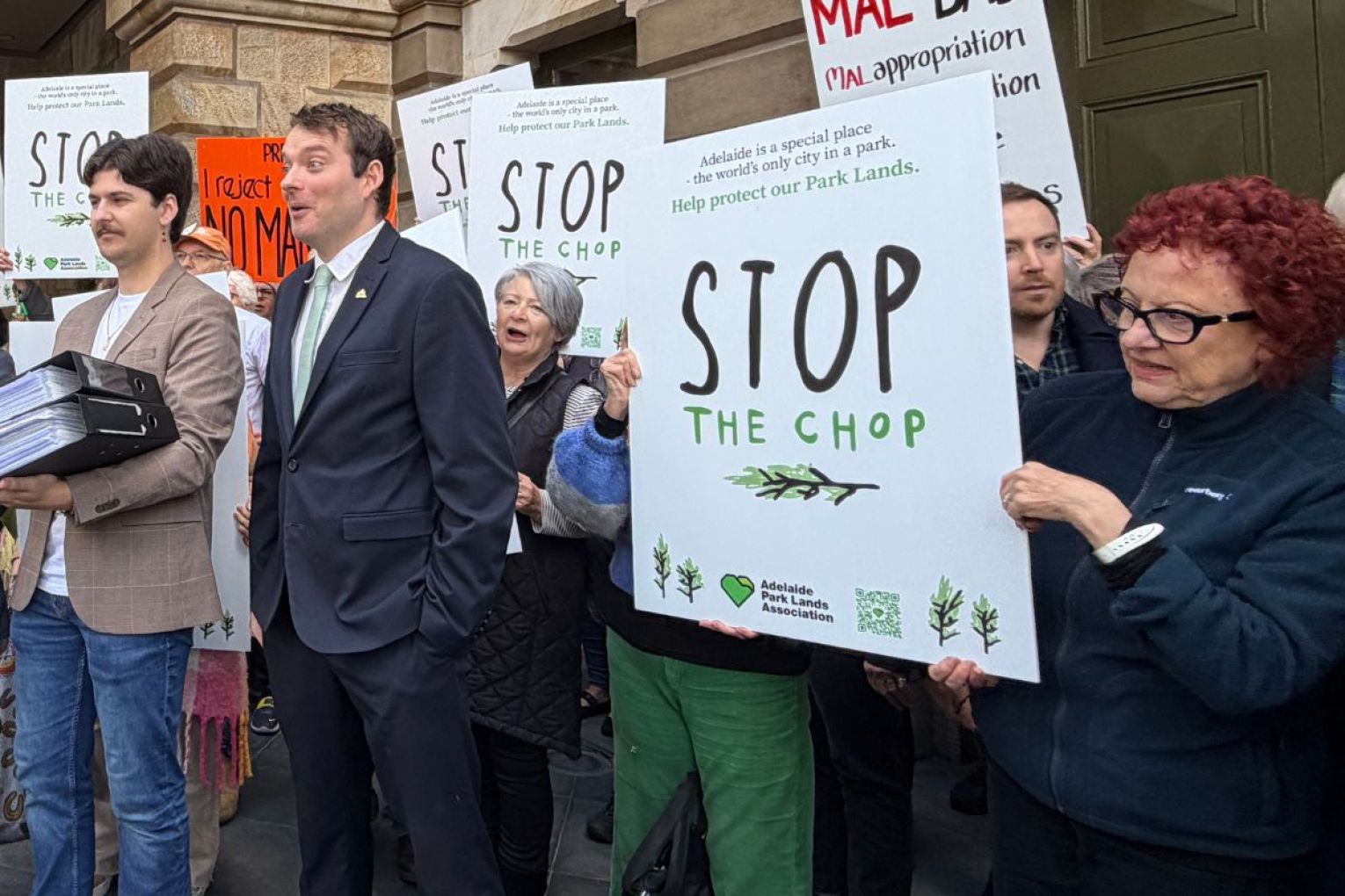 Dozens of 'Stop the Chop' supporters have gathered outside Adelaide Town Hall as a petition hits 13,000. Photo: Helen Karakulak/InDaily