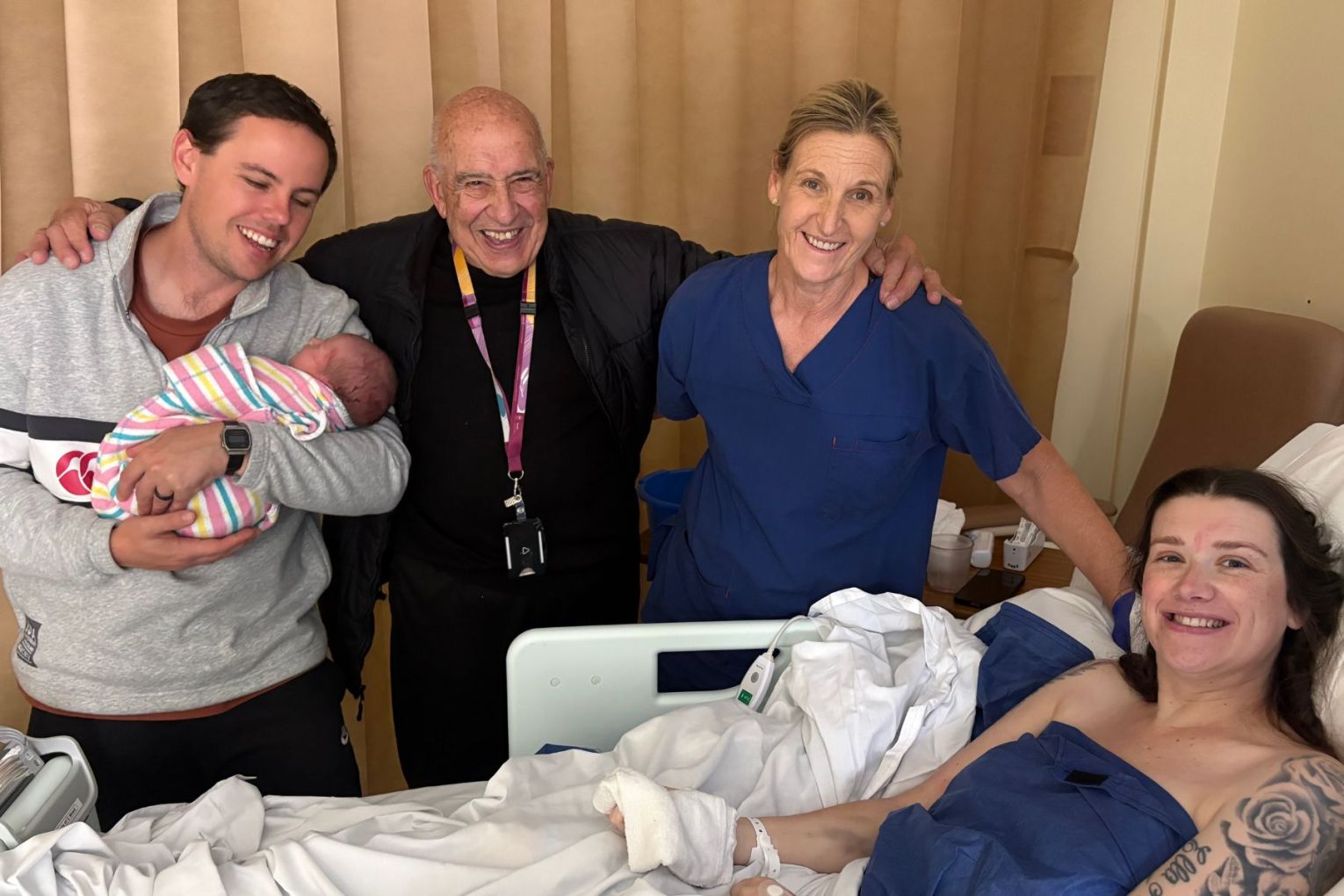 "How very fortunate I feel to be able to practice my profession and this specialty." Associate Professor John Svigos with the last baby he delivered. Image: supplied