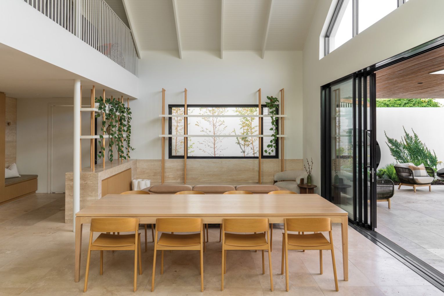 The sliding doors are an essential part of the indoor-outdoor fusion. “They’re open most of the time,” owner Pete says.
