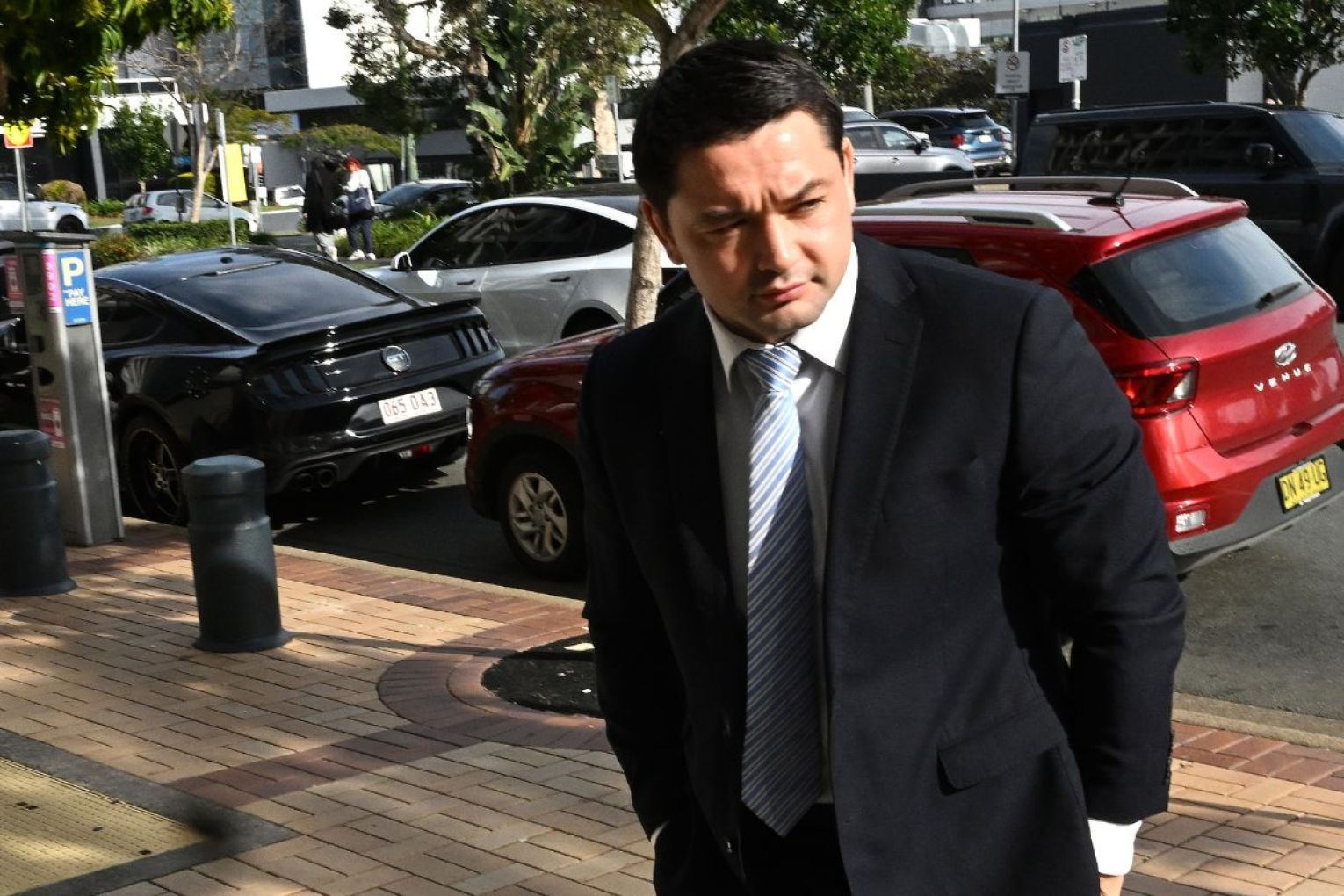NRL player Brandon Smith is seen arriving at Southport Magistrates Court on the Gold Coast, Thursday, August 6, 2026. AAP Image/Darren England)