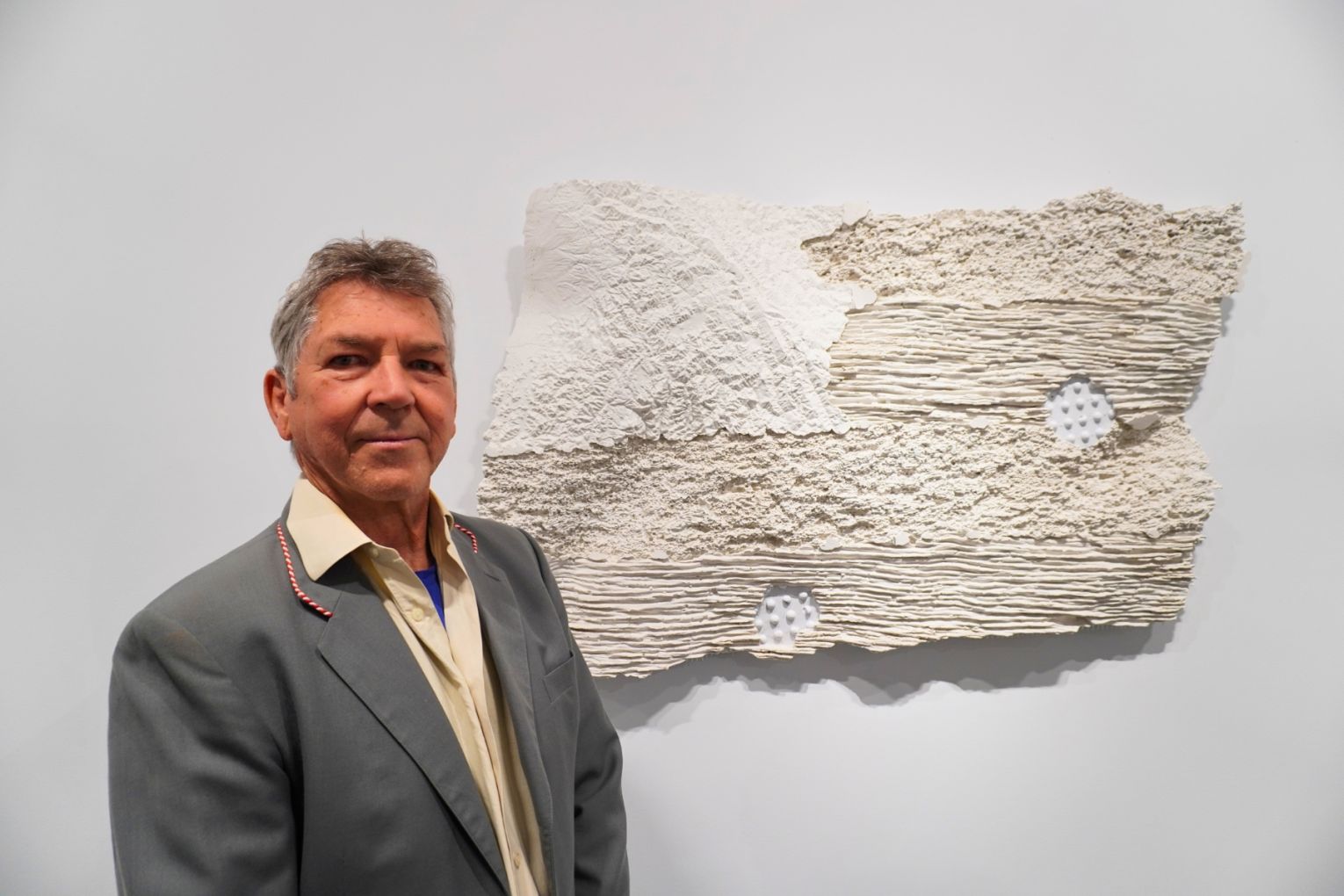 Artist Bruce Reynolds' exhibition White Flags is showing at The Renshaws gallery in Brisbane and includes artwork Land and Sea, 2026. Photo: Josephine Renee