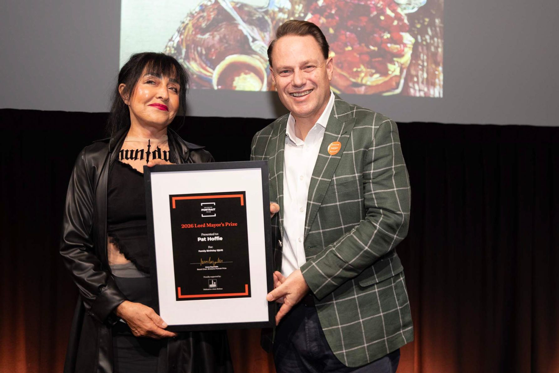 Lord Mayor Adrian Schrinner awarding winner Pat Hoffie