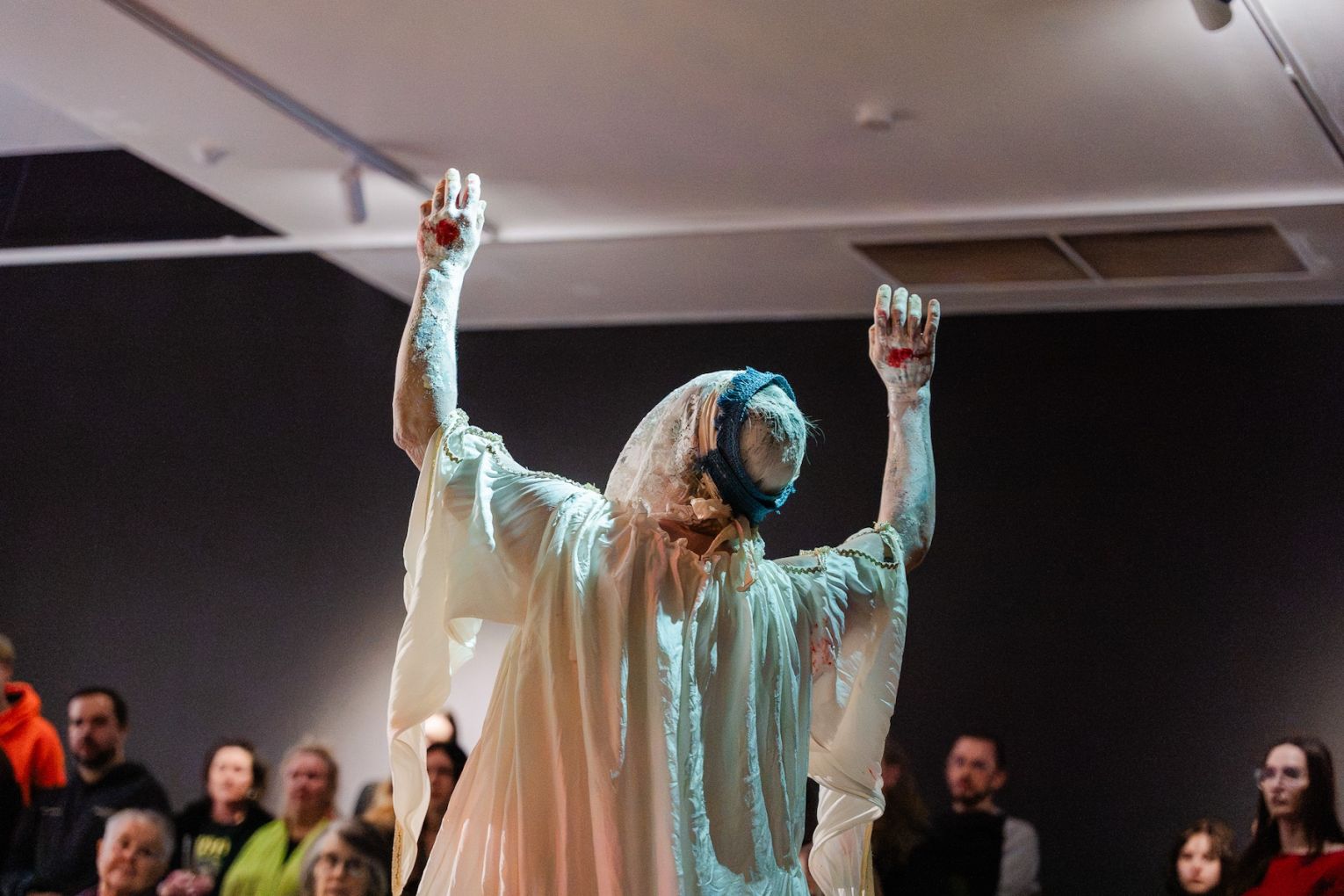 Emiko Artemis performs at the opening of Leaves: Eco-Anxiety at Adelaide Contemporary Experimental. Photo: Lana Adams / Supplied