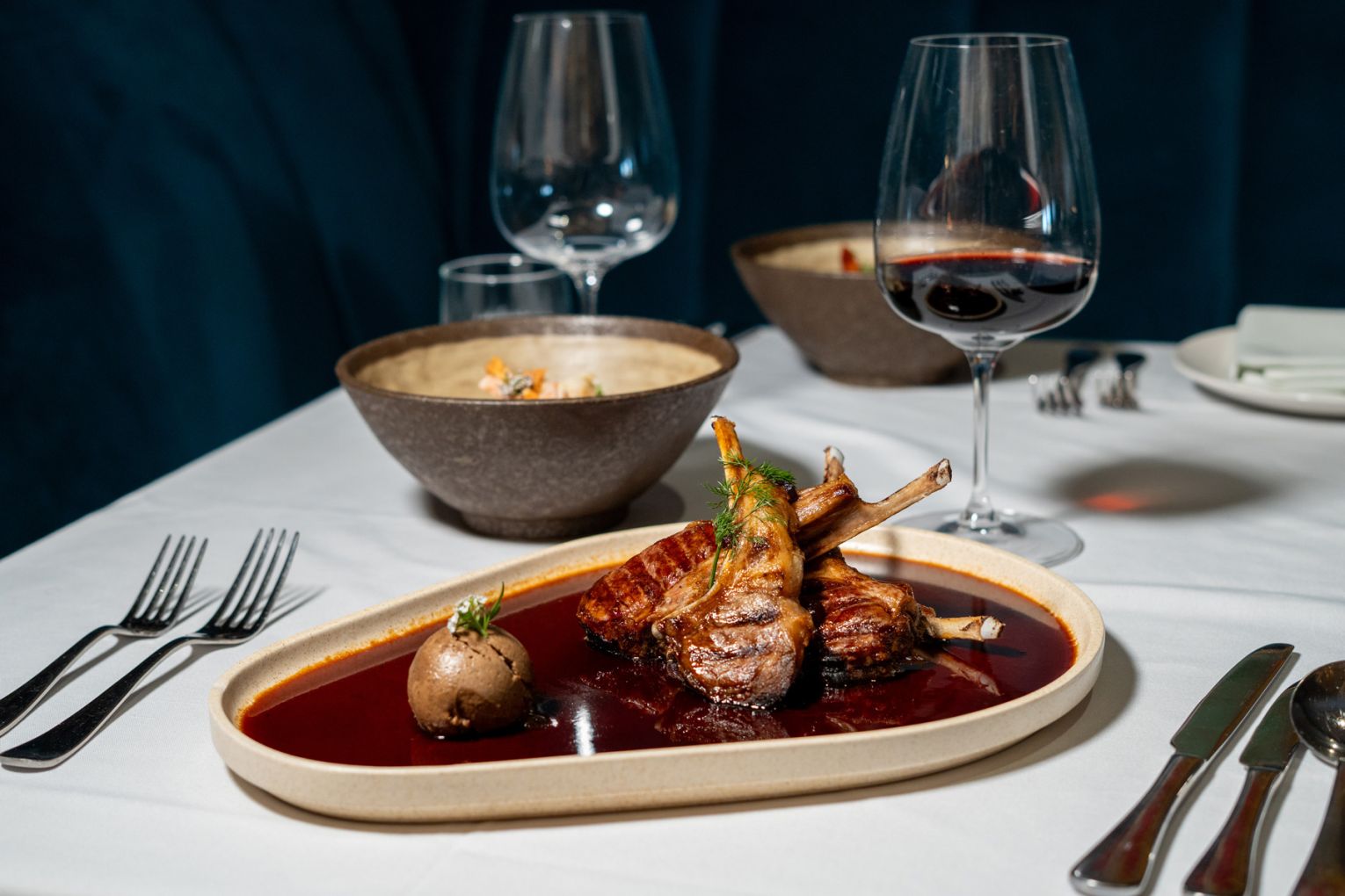 Award-winning chef Grant Madgwick and long-time business partner Antz Do Rozario are bringing some of the theatre of dining back with their latest venture, Grantz Dining Room | Credit: Food images Salt and Honey, venue images Jade Quinlivan