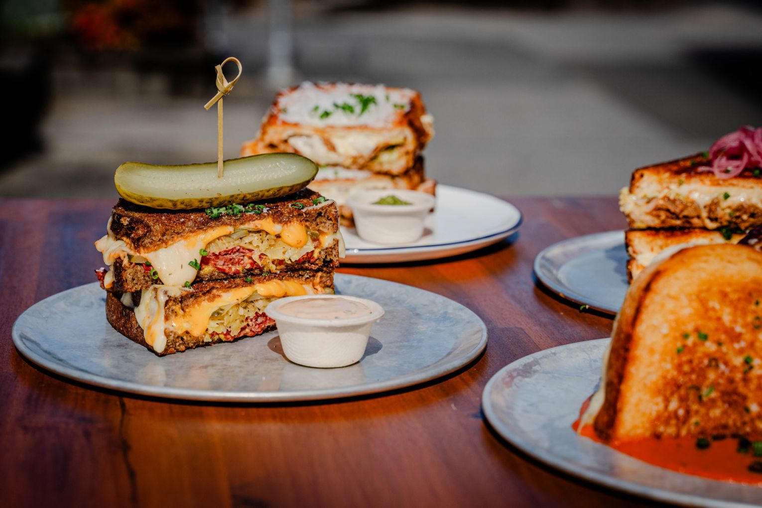 Hot Mess Deli has arrived in Varsity Lakes with a stacked menu of cheesy, saucy sangas | Credit: Gold Coast Foodie