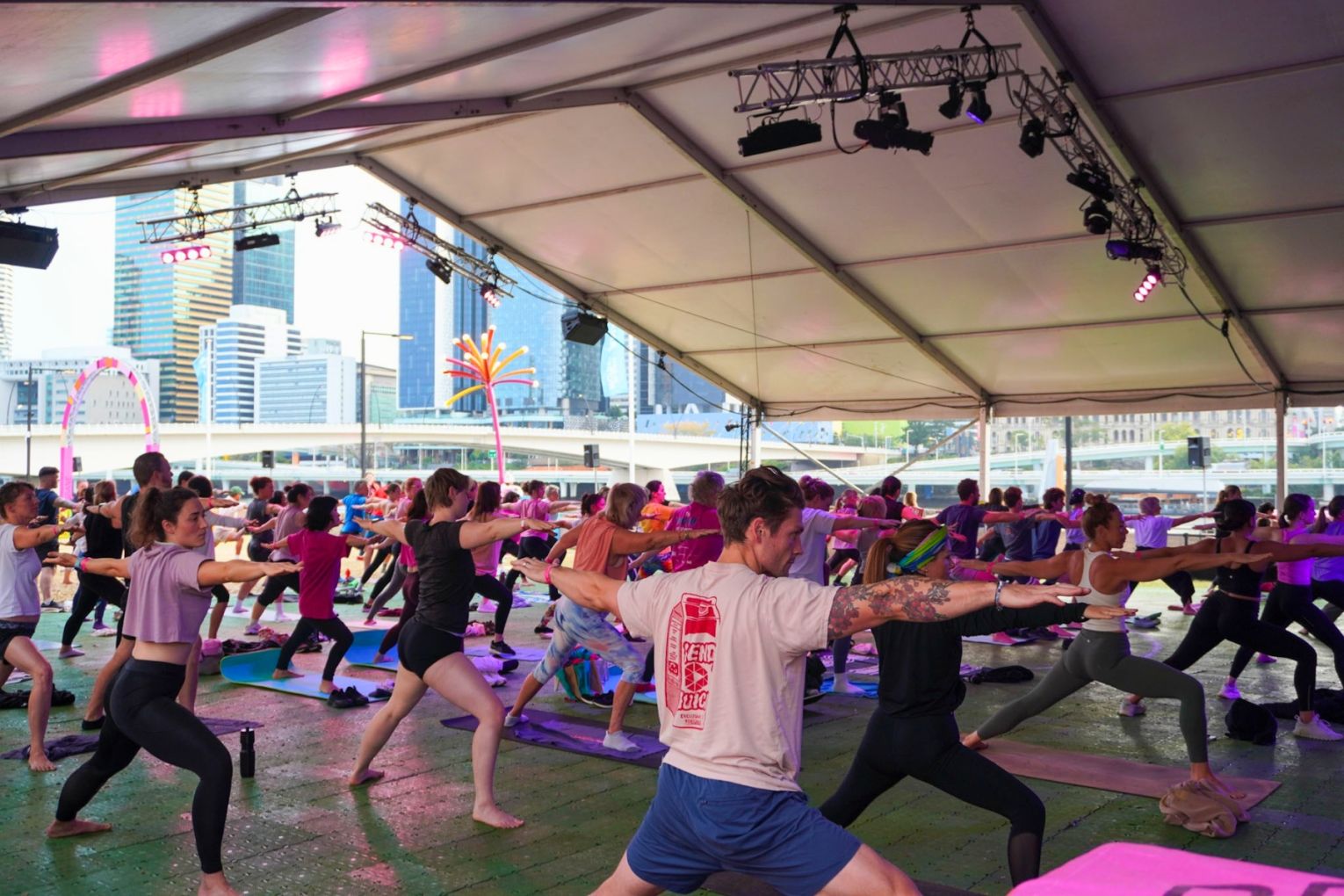 At Brisbane Festival on September 12, global alcohol-free early morning dance and wellness event DAYBREAKER - yoga, fitness and dance to start the day.