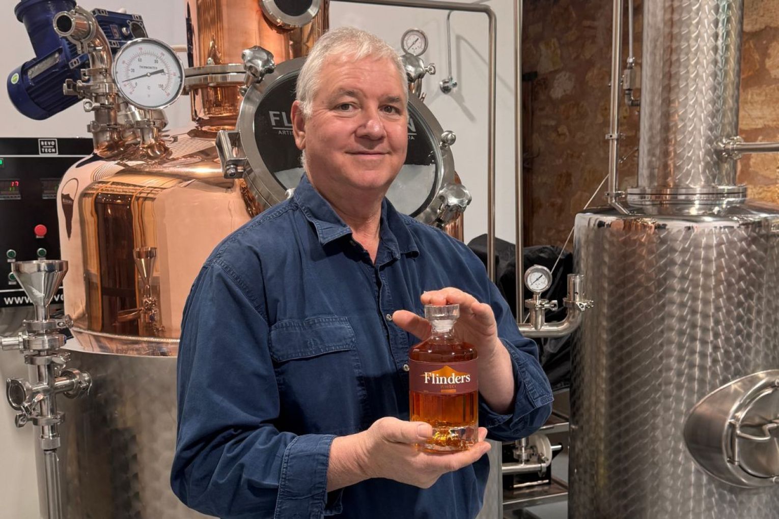 Alby Trotta holding the new whisky set to be released this Sunday. Photo: supplied.