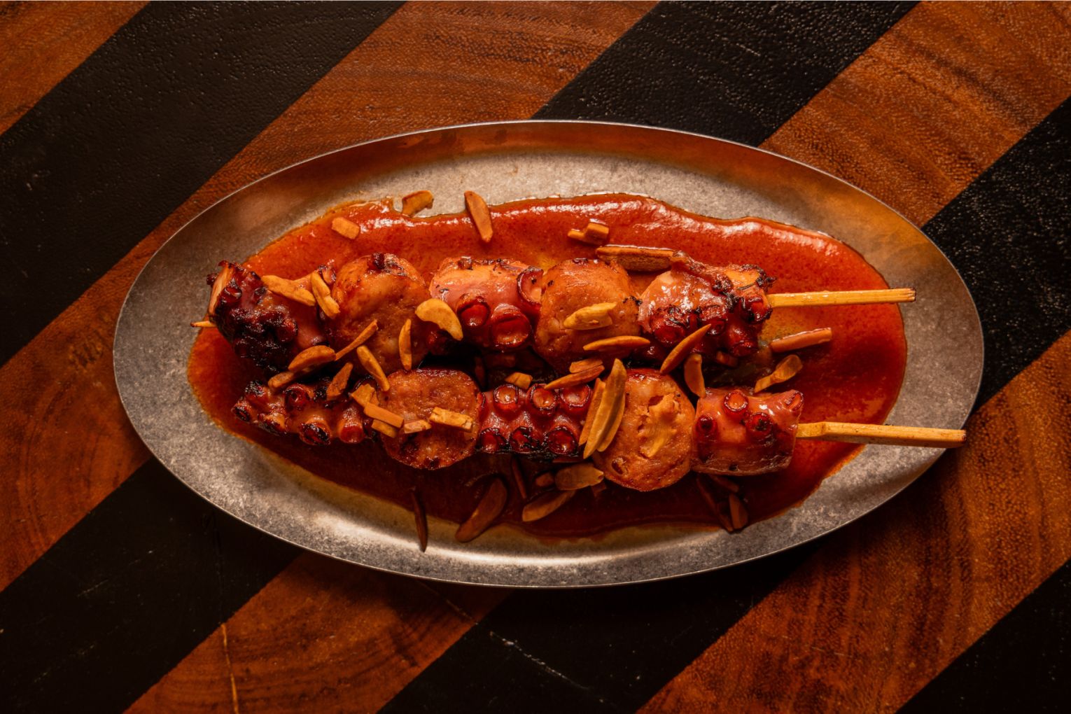 Roasted octopus, AIRA Rooftop Bar | Credit: image supplied