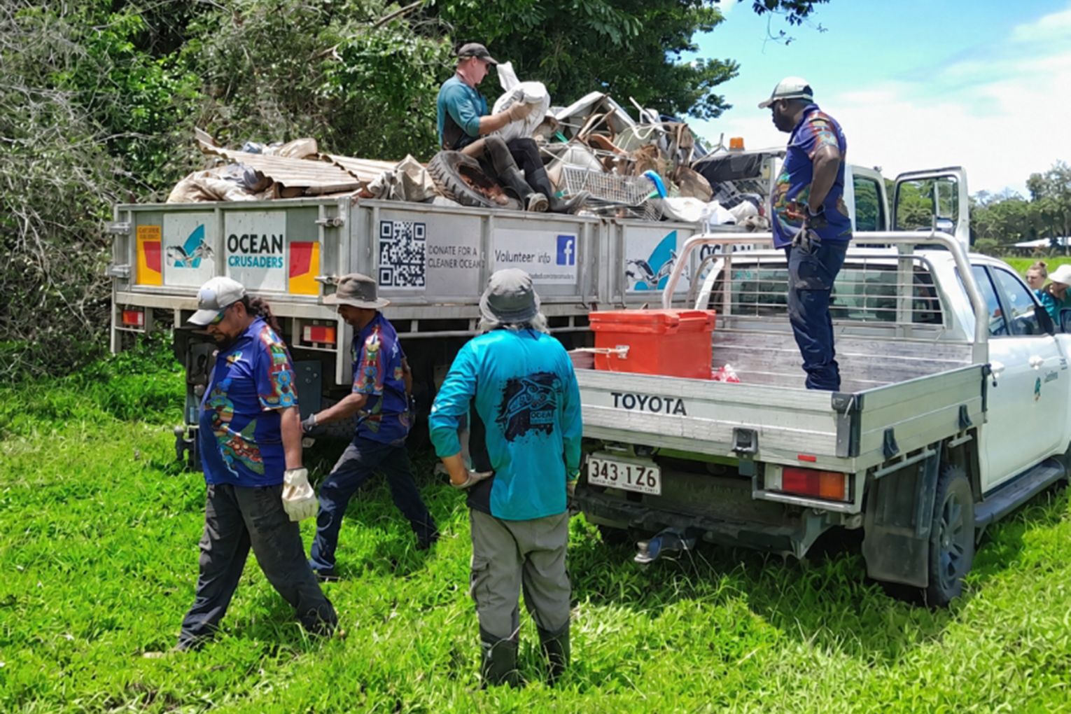 A clean-up team involving Ocean Crusaders, Jabalbina Yalanji Aboriginal Corporation and Douglas Shire Council removes debris from Marrs Creek, Mossman | Credit: image supplied