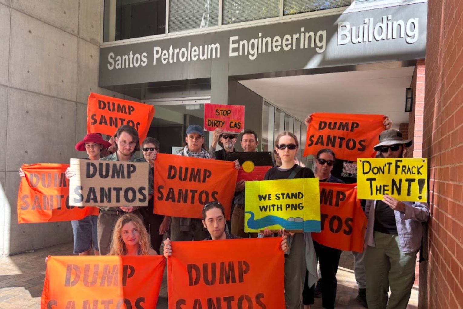 Students protested to Dump Santos from the university building earlier this year. Picture: Conservation Council/supplied.  