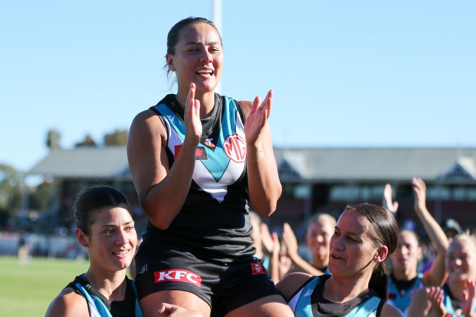 Port captain Justine Mules-Robinson is chaired off after her 100th game last month. (Matt Turner/AAP PHOTOS)