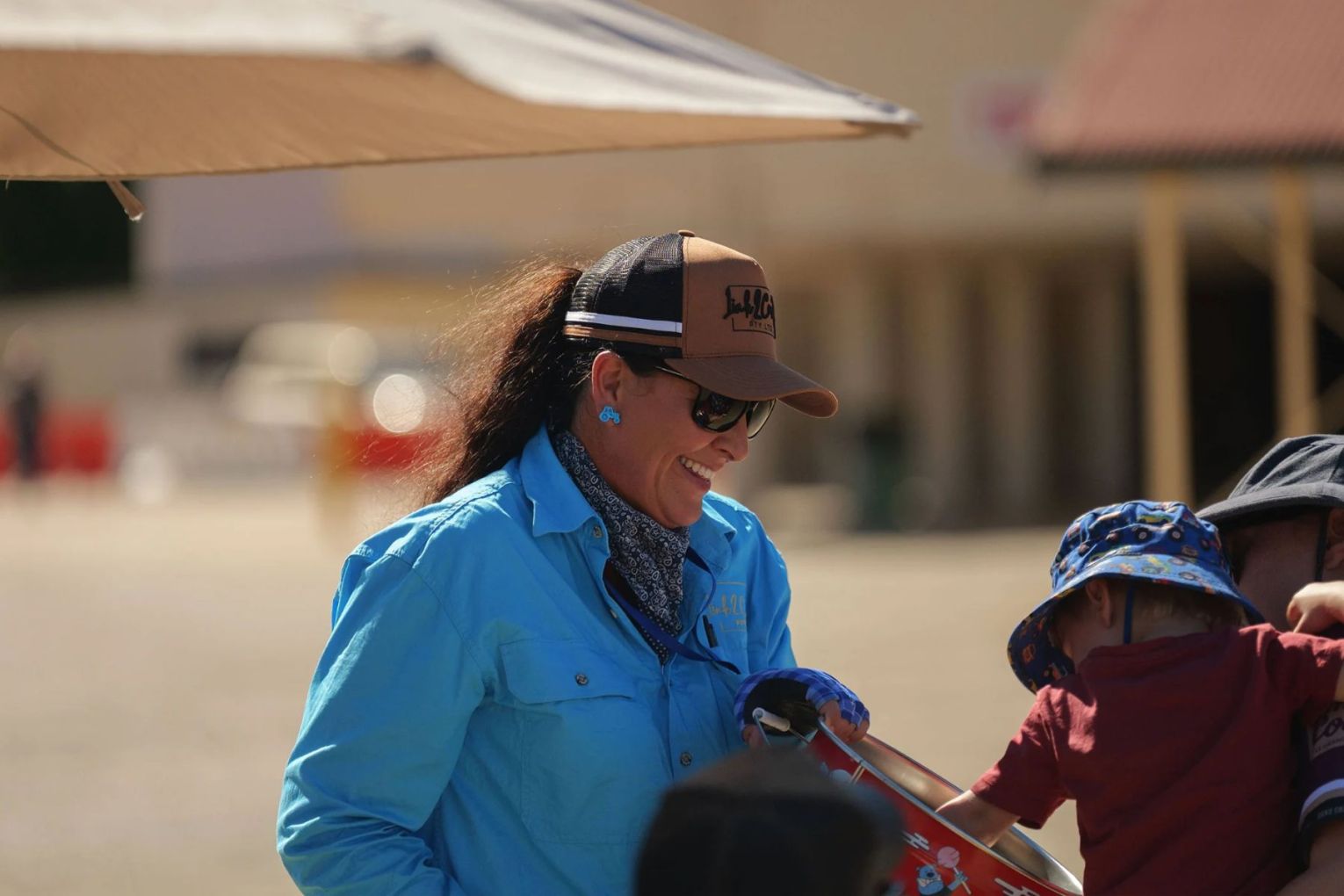 Nicole Chiesa founded a program that works with schools to give students hands-on experience in farming, from putting harnesses on horses to operating a harvester. Picture: via Link 2 Country