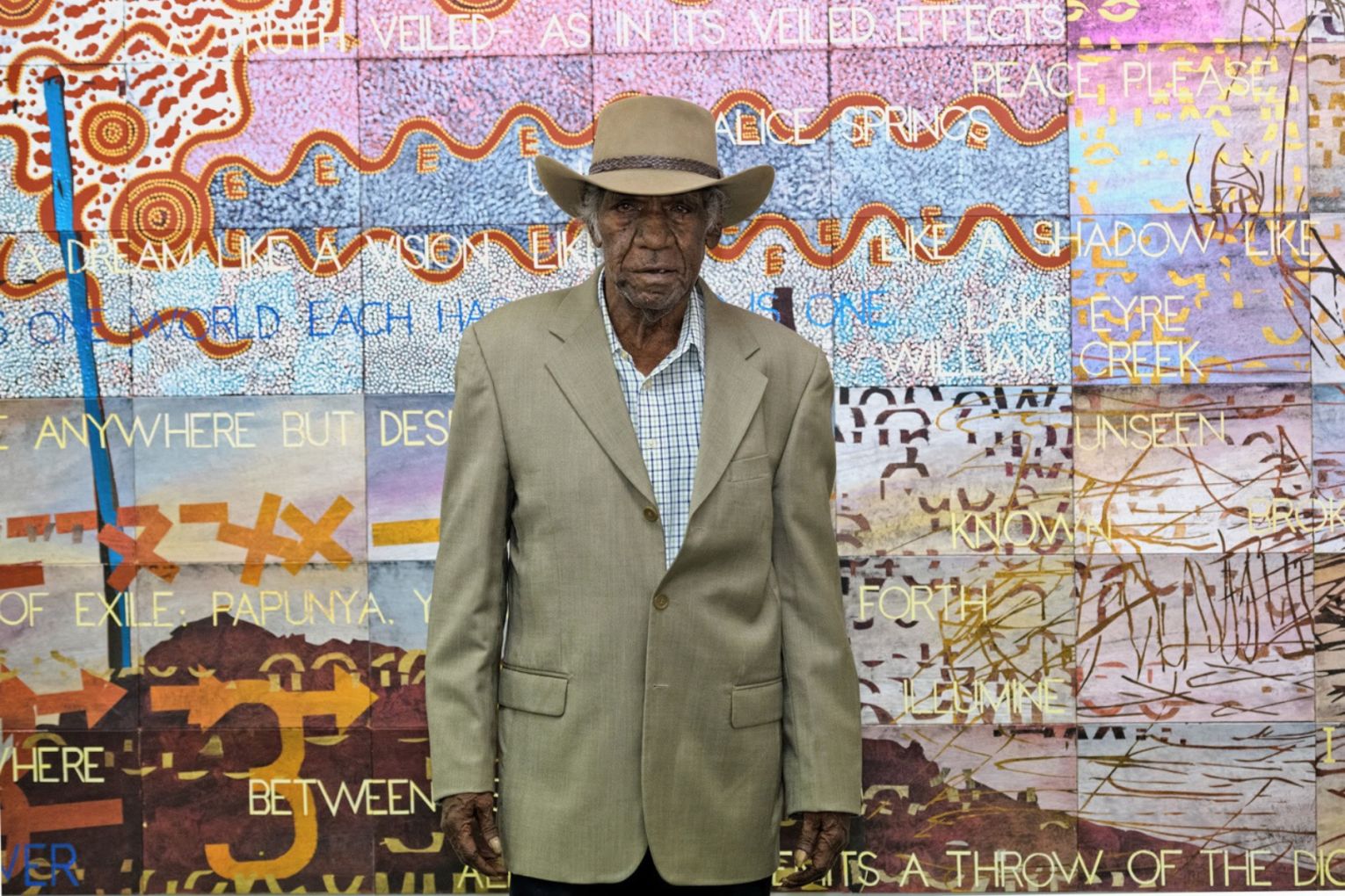 The artist Michael Nelson Jagamara in 2018. Fireworks Gallery's current retrospective. Possum Stories, is on now. Photo: Mick Richards