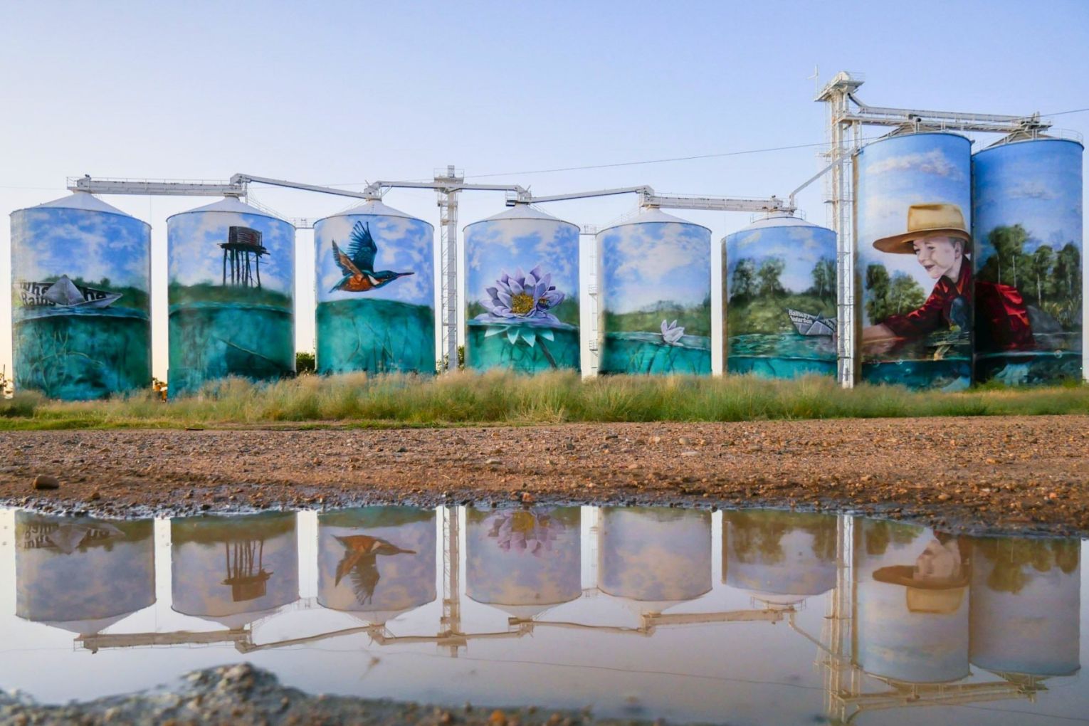 Yelarbon silos, where one of the biggest silo artworks in Australia, When the Rain Comes, stretches 24m into the sky and across eight GrainCorp silos. Photo: Goondiwindi Regional Council