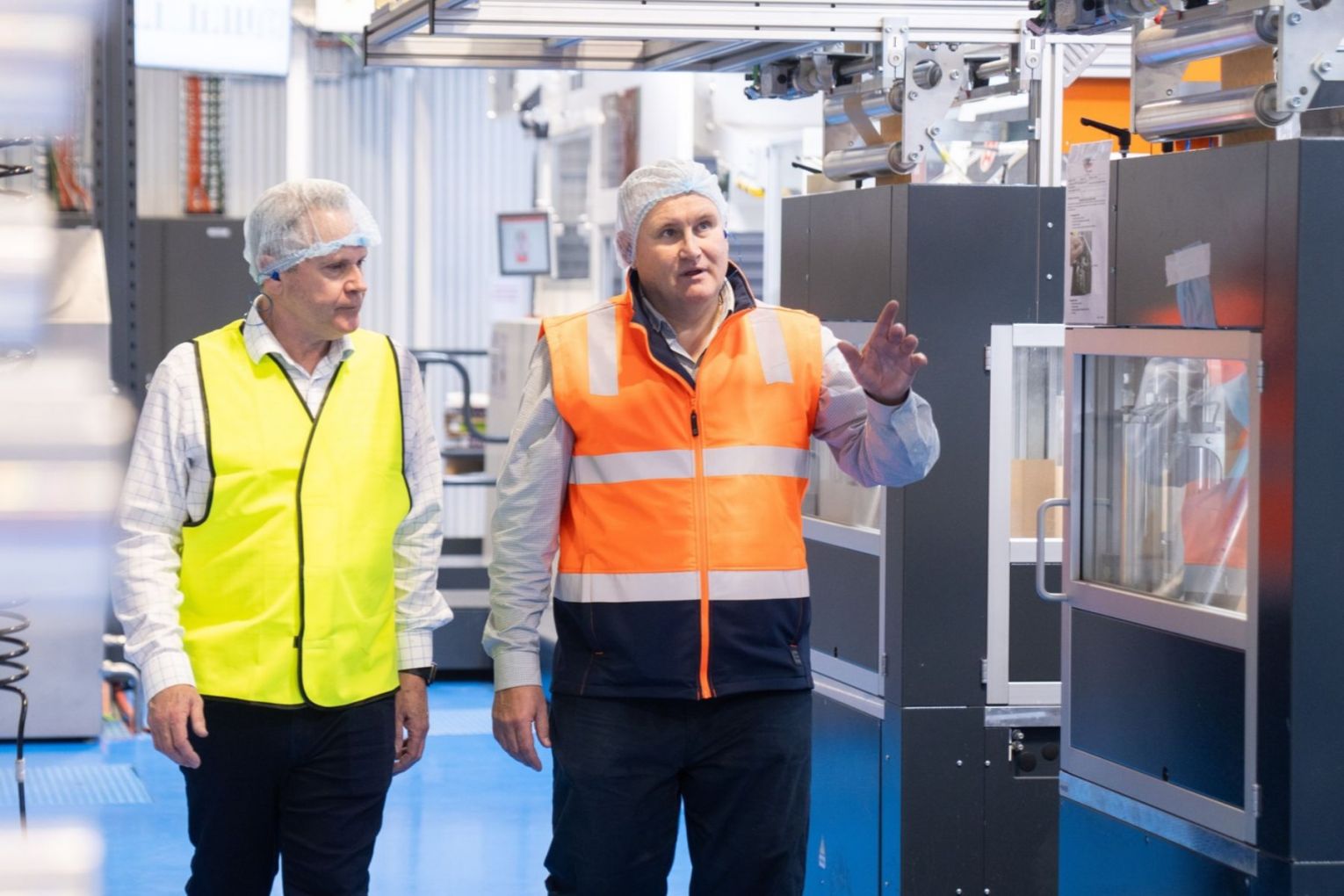Pope Packaging CEO Craig Elkington and paper sacks Australia general manager Matt Sullivan tour the new facility. Picture: Supplied.