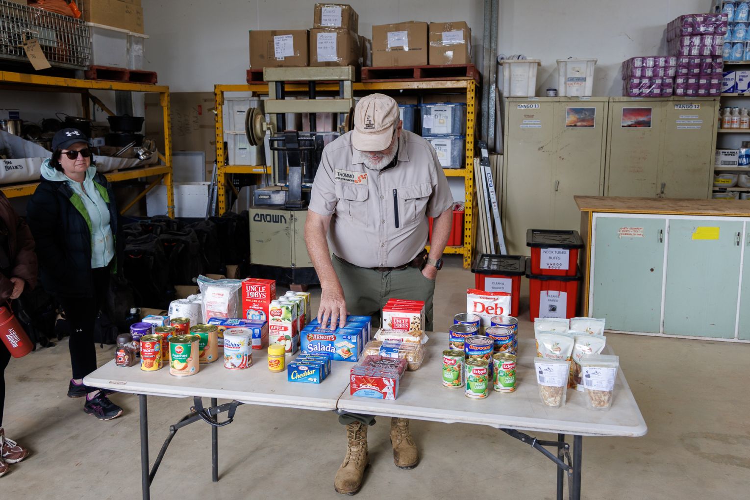 Volunteer Mark Thomas with rations provided to groups in the field
