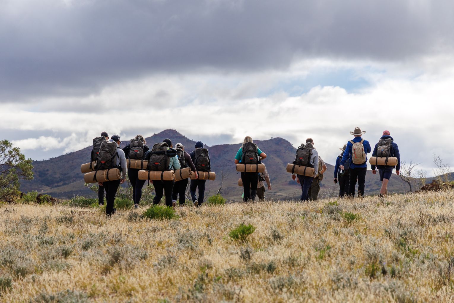 The terrain varies from wide-open plains to rocky mountain scrambles and creek crossings.